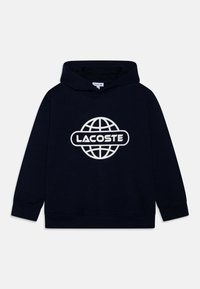 Sudadera con capucha azul marino hecha de algodón, con un gran logo blanco de Lacoste y un gráfico de un globo en el frente, con capucha ajustable mediante cordón y puños acanalados.