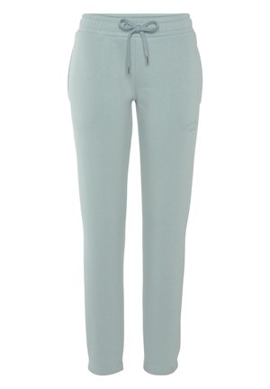 Light blue sweatpants in soft fabric, featuring an elastic waistband with drawstring and subtle branding on the side.