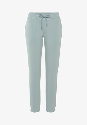 Light blue sweatpants in soft fabric, featuring an elastic waistband with drawstring and subtle branding on the side.