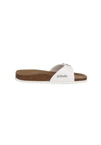 White slide sandal with a cork footbed, featuring a cross-strap design, silver hardware accent, and a textured white outsole.