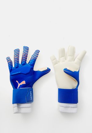 Blue goalkeeper gloves with white latex palm, textured grip, striped blue and pink accents, elastic wrist cuffs, and branding details.