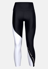 Czarno-białe legginsy sportowe z wysokim stanem, z geometrycznym wzorem w blokach kolorów i złotym logo „Under Armour”.