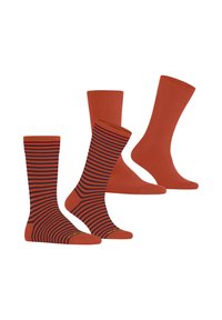 Zwei Paar Knöchelsocken, eines einfarbig rostorange und das andere rostorange mit schwarzen horizontalen Streifen, nebeneinander präsentiert.