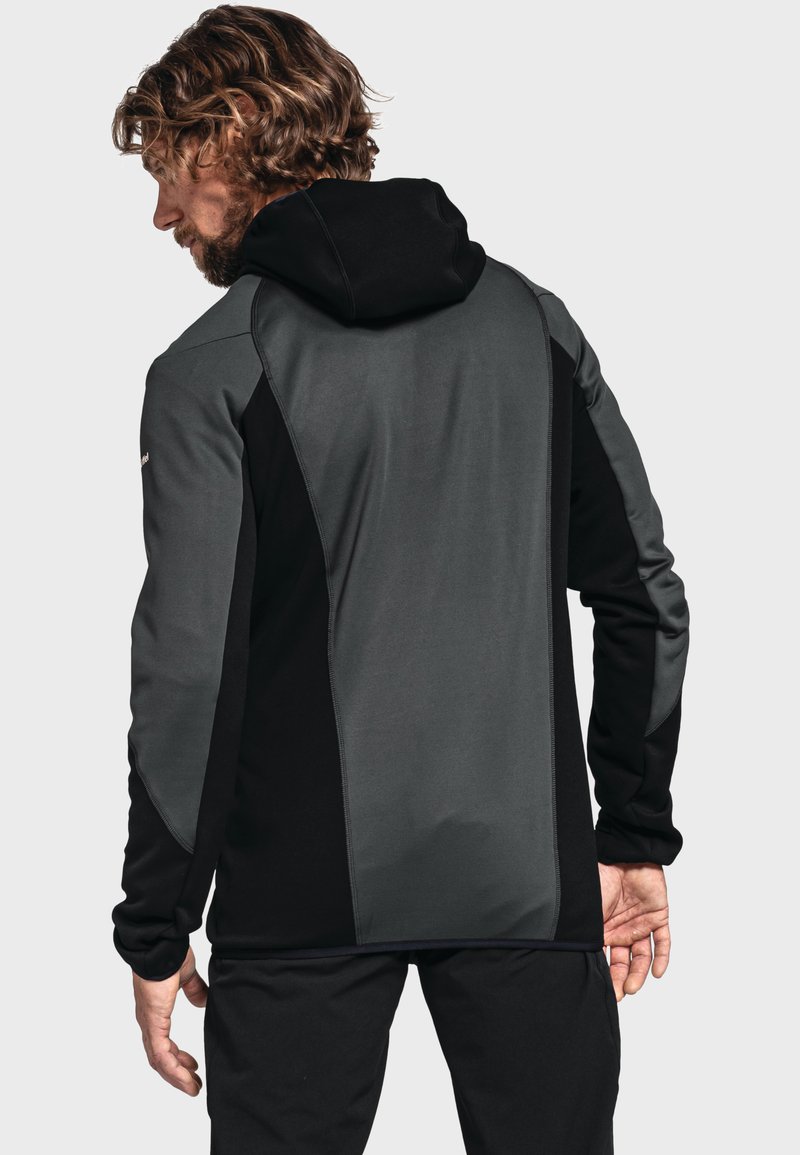 Herren Kapuzenjacke in Grau und Schwarz. Sie zeichnet sich durch ein elegantes Design mit glatter Textur und kontrastierenden Paneelen aus. Maschinenwaschbarer Stoff.