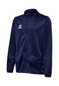 Navyblauwe sportjas met rits, lange mouwen, opstaande kraag, zijzakken en wit hummel-logo op de linkerborst.