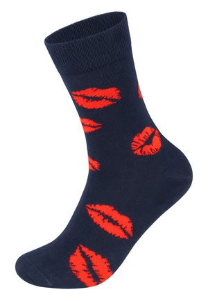 Navy cotton ankle sock featuring a repeating pattern of bright red lipstick kiss prints. Ribbed ankle cuff; smooth texture.