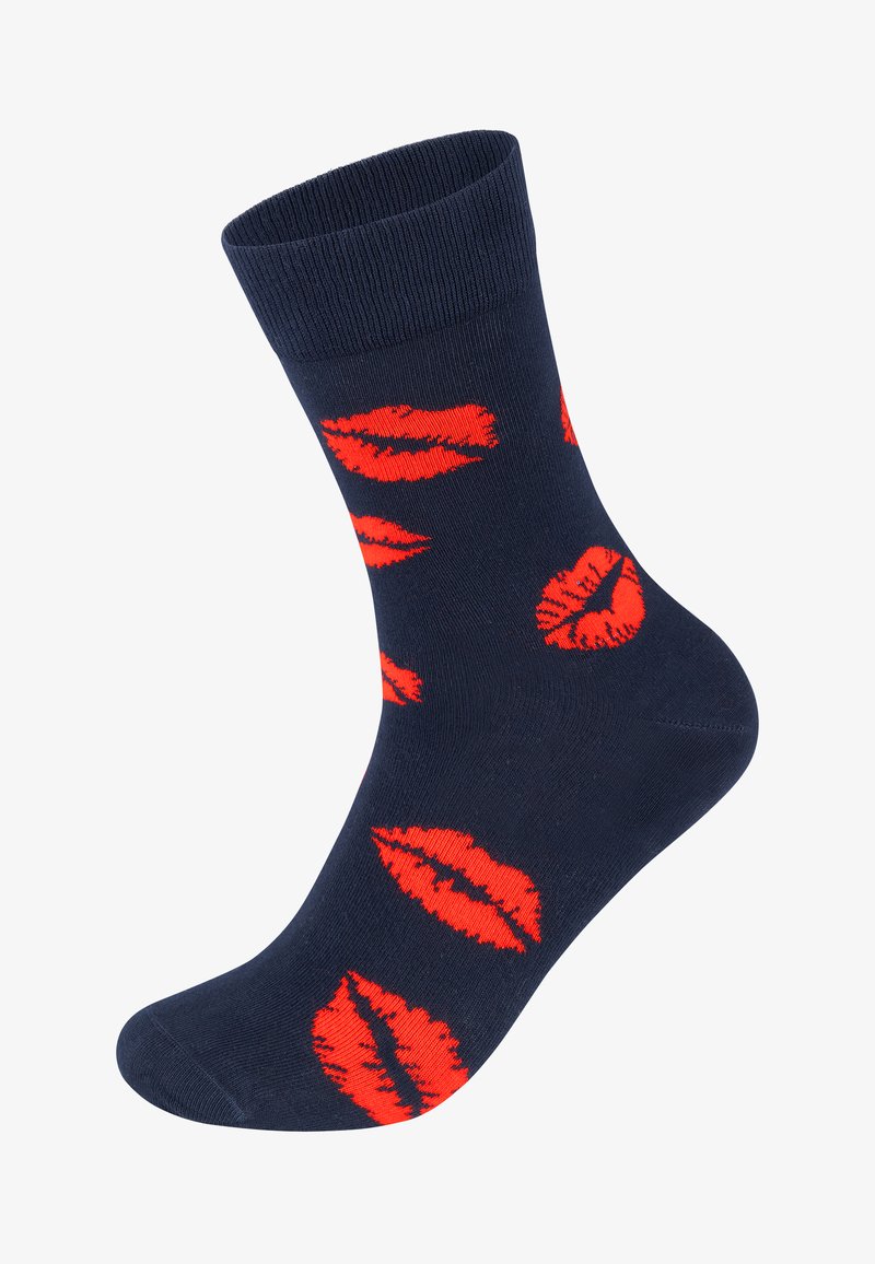 Jūras spēku kokvilnas potītes zeķes ar atkārtotu spilgti sarkano lūpu krāsas nospiedumu rakstu. Ribota potītes mala; gluda tekstūra.