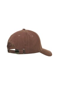 Brown cotton cap with a curved brim, adjustable strap at the back, and ventilation eyelets on each side. Smooth texture, simple design.