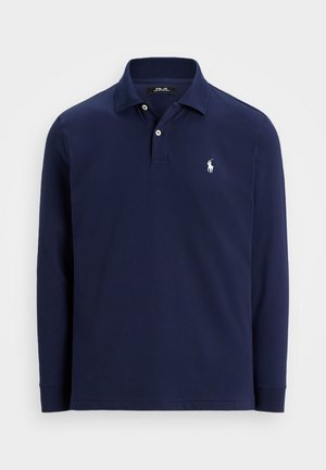 Marineblå langærmet polo shirt med krave, to hvide knapper og lille hvid broderet hest- og rytterlogo på venstre bryst.