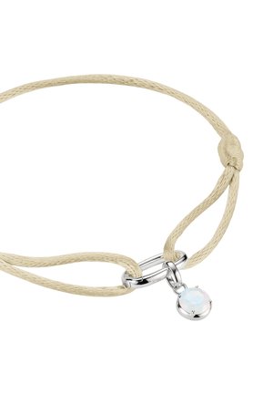 Beige braided cord bracelet with silver clasp featuring a small round opalescent gemstone charm.