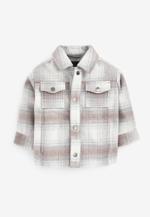Veste à carreaux pour enfants en beige, blanc et marron clair avec manches longues, boutons-pression devant et deux poches poitrine à rabat.