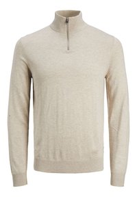 Pull beige avec col montant et fermeture à demi-zip. Manches longues, poignets et ourlet côtelés. Texture douce, tissu en maille légère.