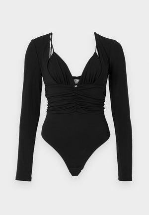 Black one-piece swimsuit with long sleeves, deep V-neckline, gathered front, and high-cut leg openings. Smooth texture, minimal hardware accents.