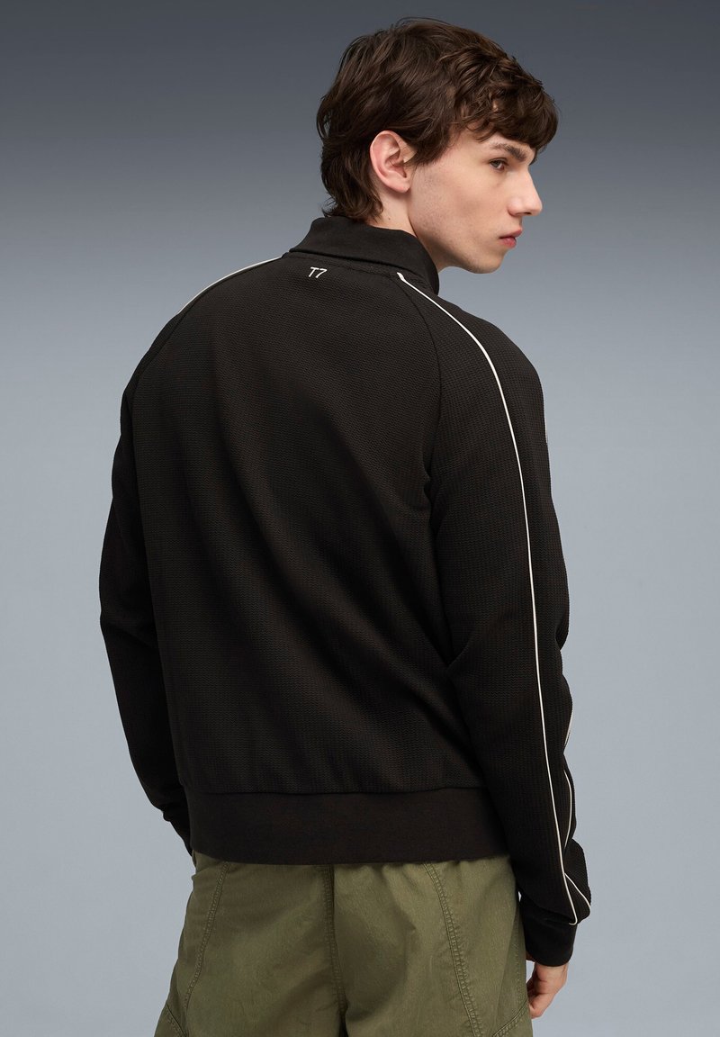 Puma Lehká bunda - black