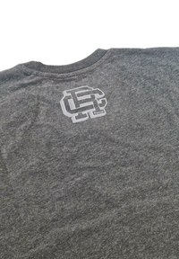 Gray cotton t-shirt with a crew neck and a front chest logo in a lighter shade. Fabric has a soft texture with a heathered appearance.