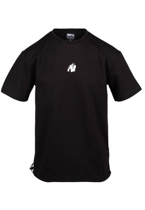 T-shirt in cotone nero con maniche corte e colletto rotondo. Presenta una grafica di un gorilla bianco sul petto e cuciture laterali regolabili.