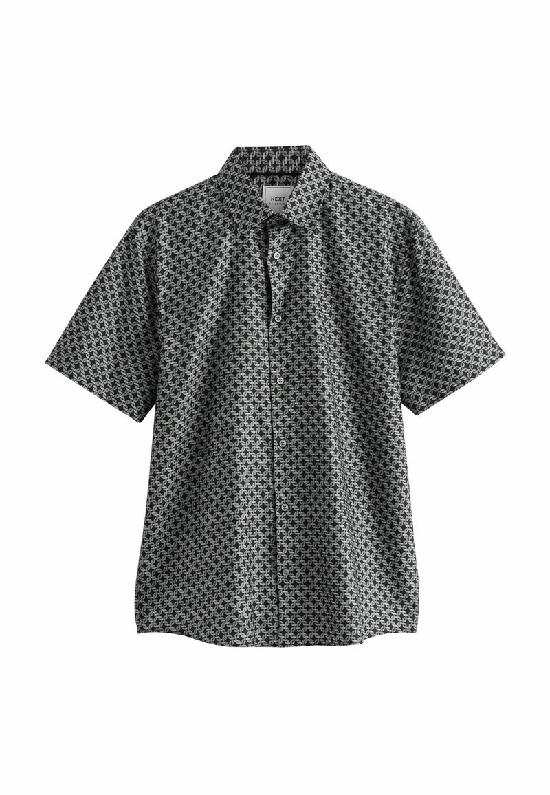 Short-sleeve button-up shirt in black and white with a geometric pattern, featuring a fold-down collar and a relaxed fit. Cotton fabric.