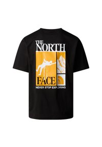 Sort bomulds T-shirt med et grafisk design i hvid og gul, inklusiv teksten "THE NORTH FACE" og et udforskningstema.
