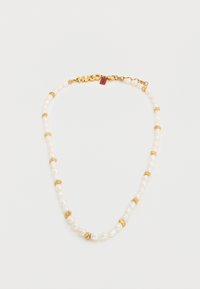 Κολιέ από πέρλες με χρυσές λεπτομέρειες και εναλλασσόμενες χρυσές και περλέ χάντρες. Διαθέτει κούμπωμα με ετι κέτα μάρκας και διακριτική λάμψη στις πέρλες.