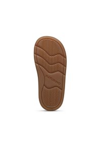 Semelle en caoutchouc brun avec un motif ondulé texturé. Présente les inscriptions "NATURINO" et "222" en relief ; forme incurvée avec des bords définis.
