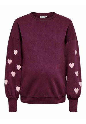 Lilla langærmet sweatshirt med pink hjertemønstre på begge ærmer og ribstrikkede manchetter og kant.