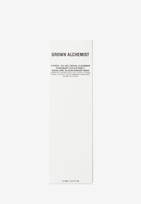 Scatola rettangolare bianca con testo nero, etichettata "Grown Alchemist Hydra+ Olio-Gel Detergente Viso", che fornisce dettagli sugli ingredienti e le specifiche.