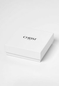 Closed white jewelry box with "CHRIST seit 1863" printed in black on the lid, placed on a white surface.
