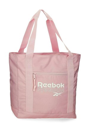 Grande borsa a spalla rosa chiaro con due manici, tasca frontale con cerniera e logo Reebok bianco sulla tasca.