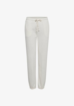 Białe dresy ze elastycznym pasem i regulowanym sznurkiem, z bocznymi kieszeniami i zwężanymi mankietami. Miękka, gładka tkanina.