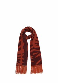 Rust and dark red patterned scarf with abstract shapes, folded with fringed ends.