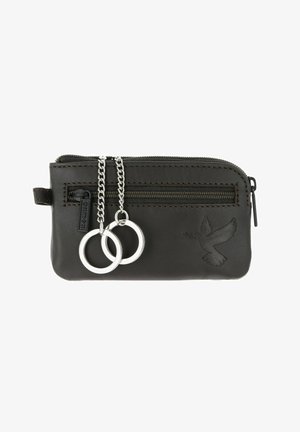Pochette à clés en cuir noir avec fermeture éclair à l’avant, deux anneaux porte-clés argentés fixés sur des chaînes et motif de colombe embossé en bas à droite.