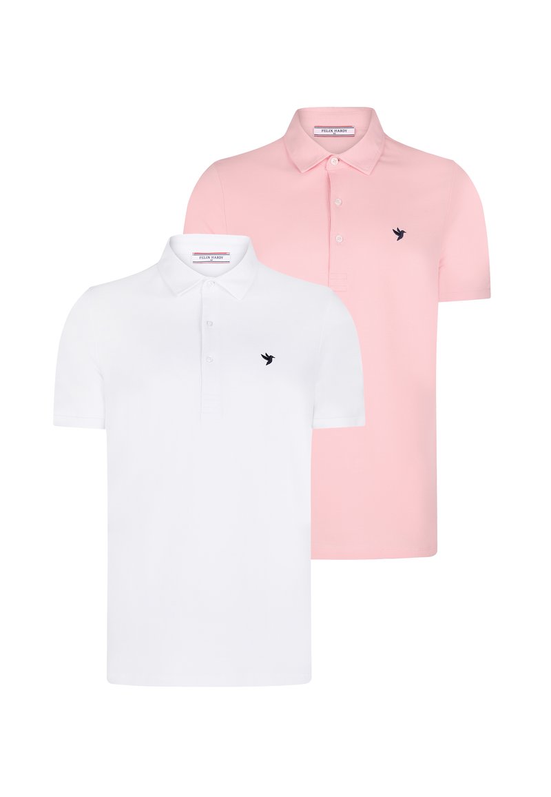 Dos camisetas de polo, una blanca y una rosa. Ambas tienen mangas cortas, un cuello y un pequeño logo de un pájaro negro en el pecho.