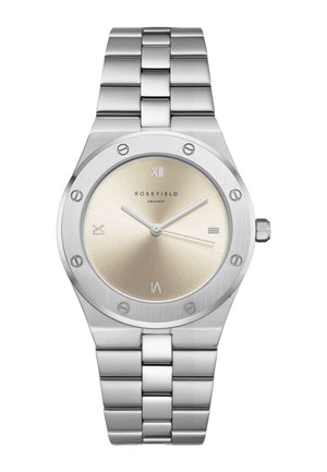 Orologio da polso in acciaio inossidabile argentato con quadrante beige, numeri romani a 12, 3, 6, 9 e tre sottili lancette che indicano le 10:10:35.