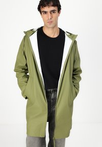 Hunter ORIGINAL ANDREA UNISEX - Vandeniui atspari striukė - loden green