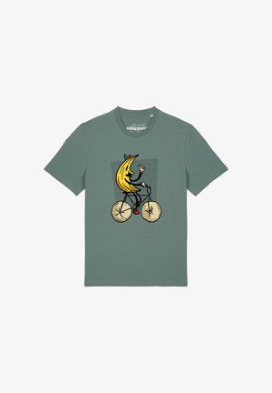 T-shirt vert avec un dessin animé d'une banane souriante faisant du vélo avec des roues en bagels, saluant d'une main.