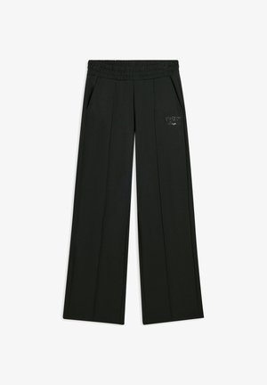 Pantalons larges noirs en tissu doux, dotés d'une taille élastique et de poches latérales, avec un logo brodé discret à l'avant.