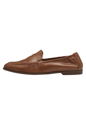 Brown leather loafers with a flat sole, featuring a stitched design and a subtle top strap. Smooth texture, classic shape.