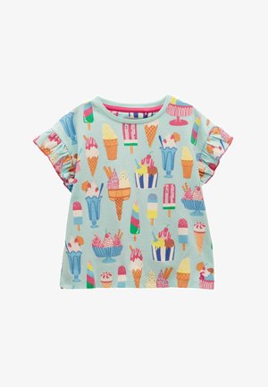 Lyseblå kortærmet skjorte med flæser på ærmerne, dekoreret med farverige mønstre af isvafler, ispinde og isdessert.