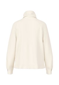 Cream-colored pullover with a high collar, raglan sleeves, and a straight hem. Made of soft fabric with a smooth texture, featuring side slits.