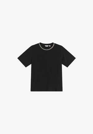 Sort t-shirt med korte ærmer og rund halsudskæring prydet med en række små dekorative blomster. Glat, bomuldsagtig tekstur.