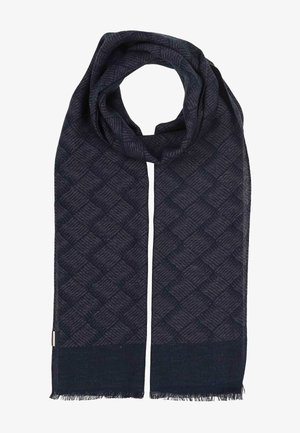 Mørkeblå halstørklæde med et tekstureret ternet mønster, rektangulær form og frynser i enderne, foldet for at danne en løkke øverst.