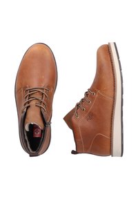 Brown leather ankle boots with rounded toes, lace-up front, stitching accents, beige rubber sole, and fleece lining visible at the opening.