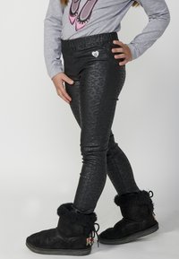 Koroshi Tajice-hlače - black