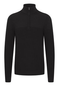 Pull en maille noir avec un col haut et une courte fermeture éclair. Doté de motifs texturés sur la poitrine et les manches, avec des poignets et un ourlet côtelés.