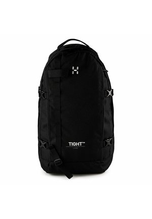 Großer schwarzer Wanderrucksack mit seitlichen Kompressionsriemen, oberem Griff und weißem "TIGHT™" sowie Logo-Schriftzug auf der Vorderseite.