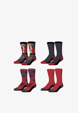 Quatre paires de chaussettes pour équipage en rouge, noir et gris ; deux comportent un personnage de pirate en dessin animé, deux ont des motifs de tête de mort et os croisés, et deux sont unies.