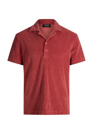 Kurzärmliges Polohemd aus Frottee in rostrot mit einer Zweiknopfblende und einem ausgestellten Kragen.