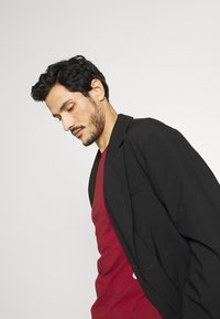 Tommy Hilfiger STRETCH SLIM FIT - Camisola de manga comprida - rouge
