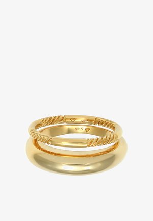 Gold ring set featuring three bands: one smooth, one twisted design, and one with a polished finish. Hallmarked with "925."