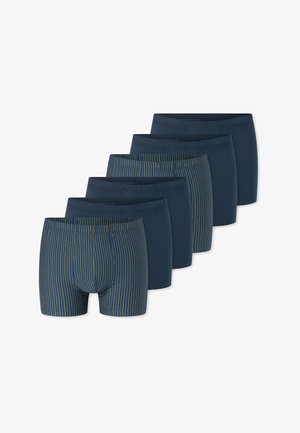 Cinq paires de caleçons boxer pour hommes, trois en bleu marine uni et deux en bleu marine avec des rayures verticales jaunes et vertes, disposées en ligne décalée.